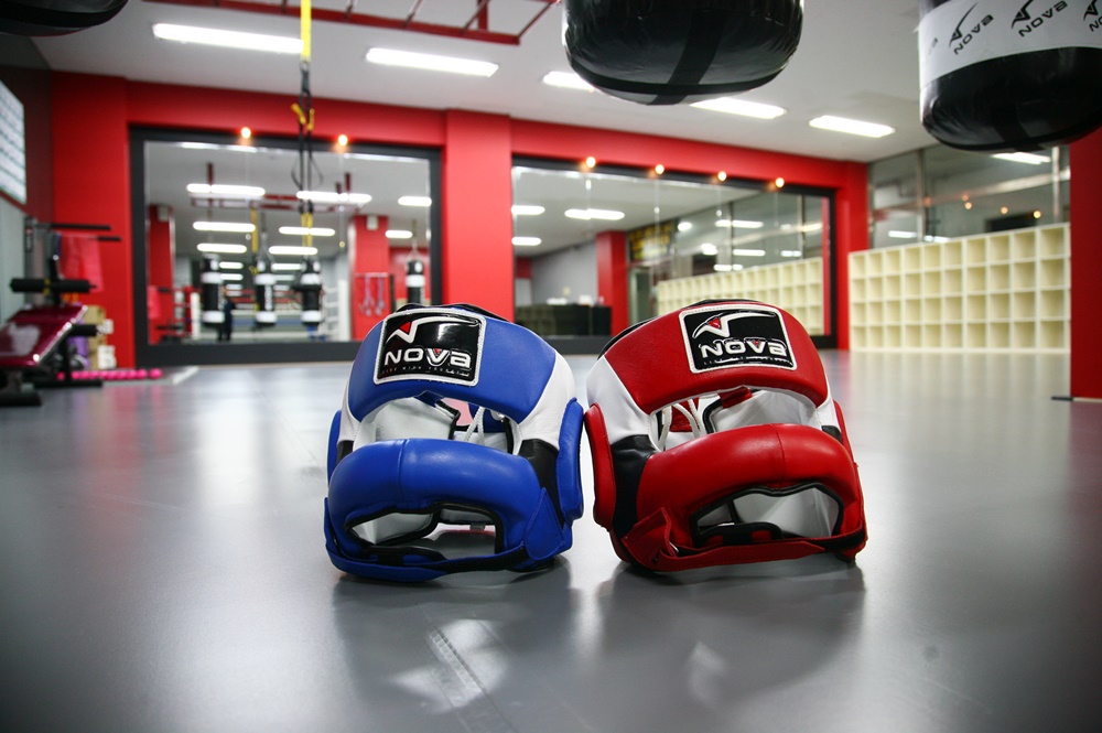 Modern boxing gym with professionally installed seamless flooring